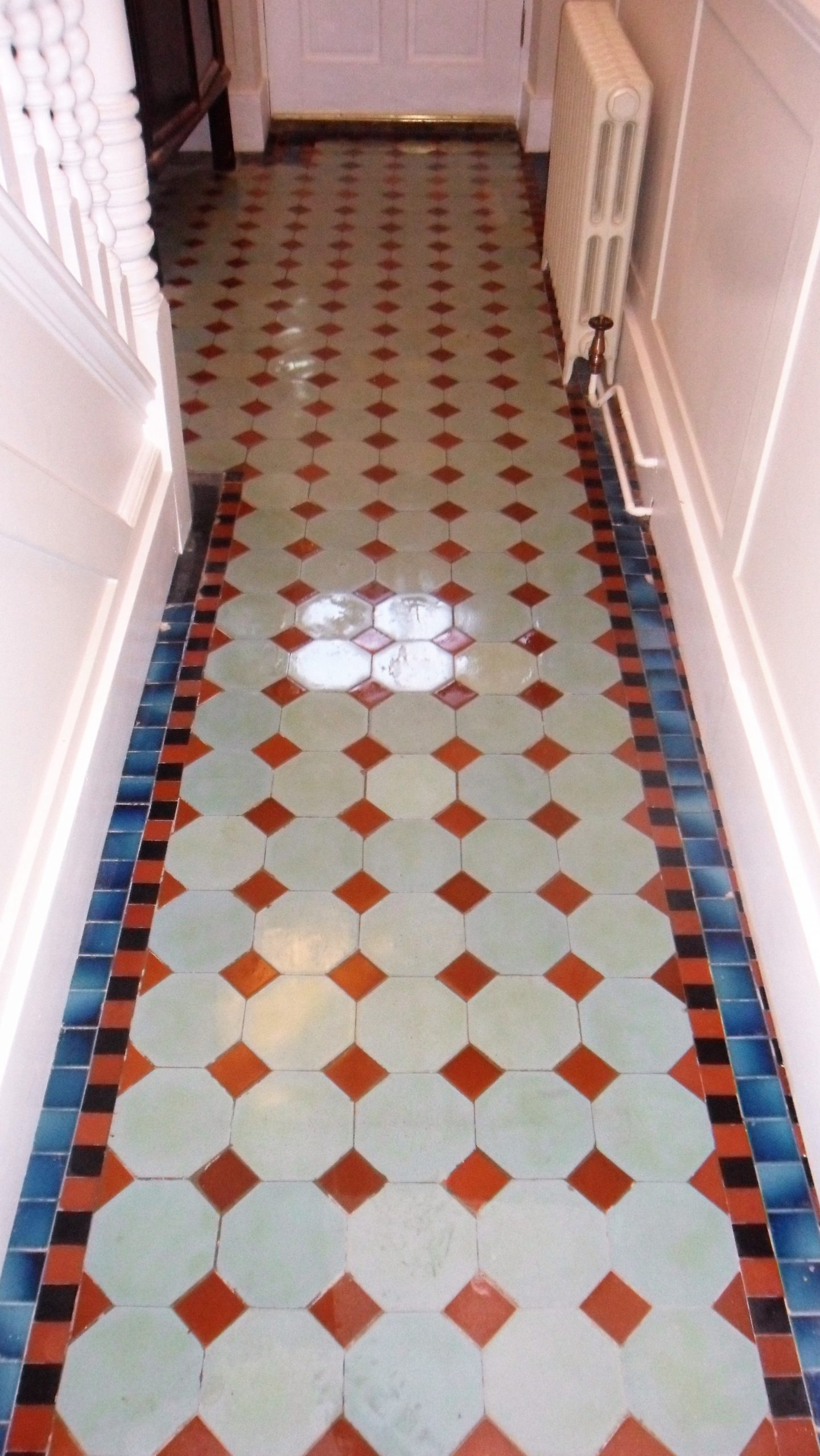 Ceramic Victorian hallway tiles cleaned.Light blue and red