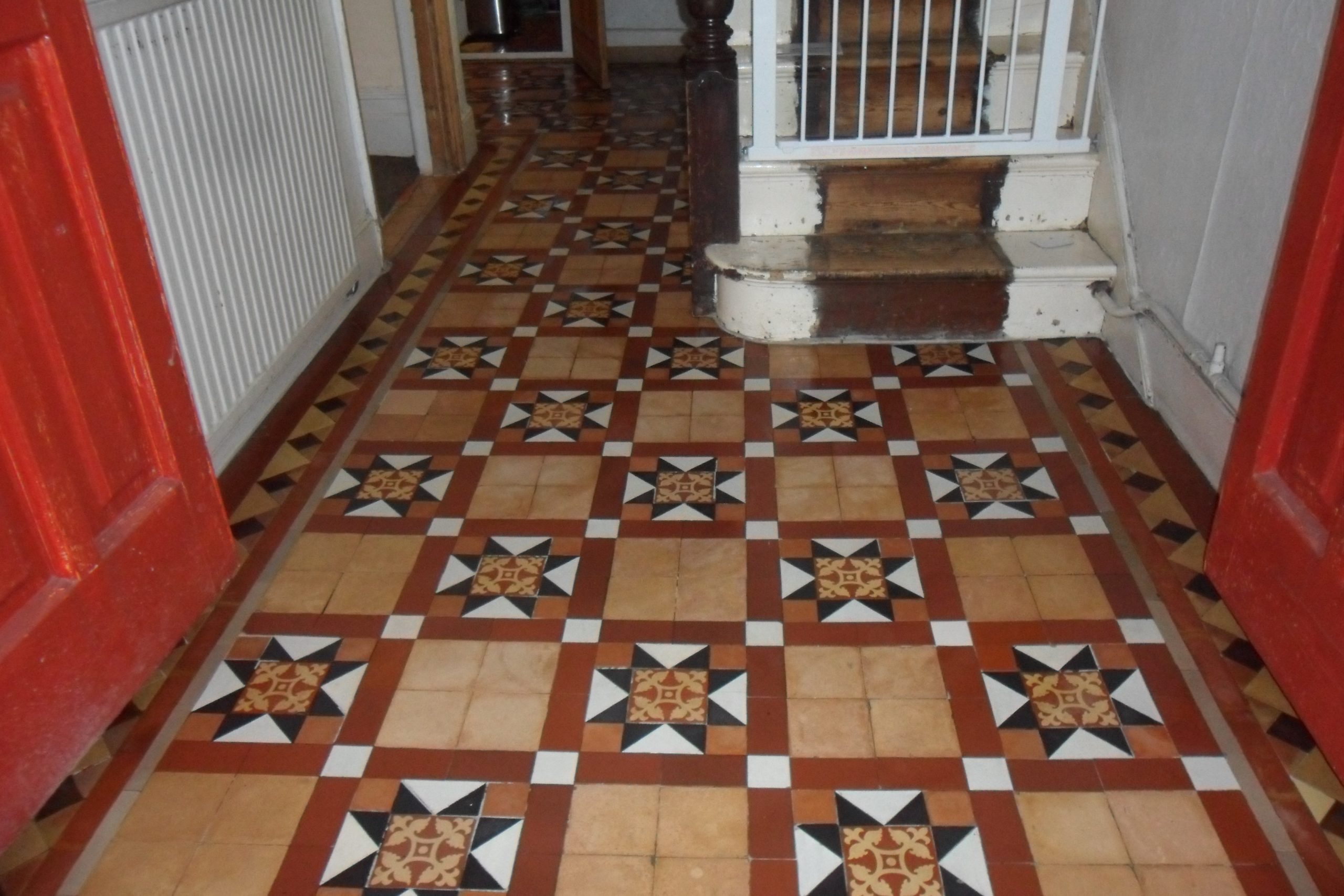 Victorian hallway tiles in Yellow , cleaned and restored near Harringay London
