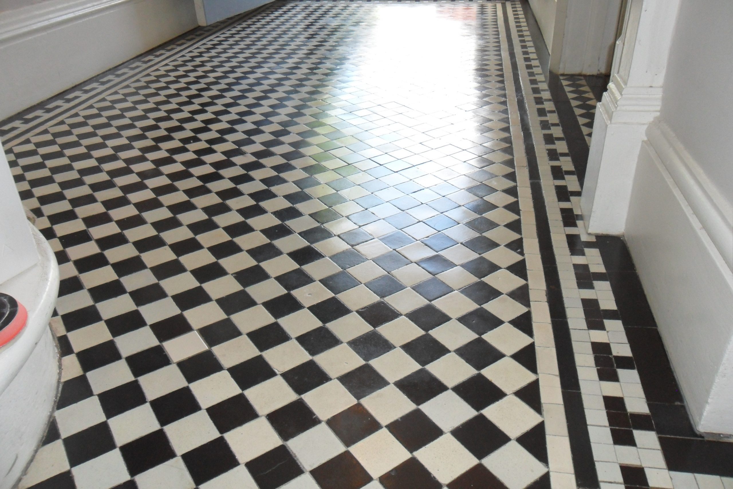 polished shiny Victorian hallway tiles North London