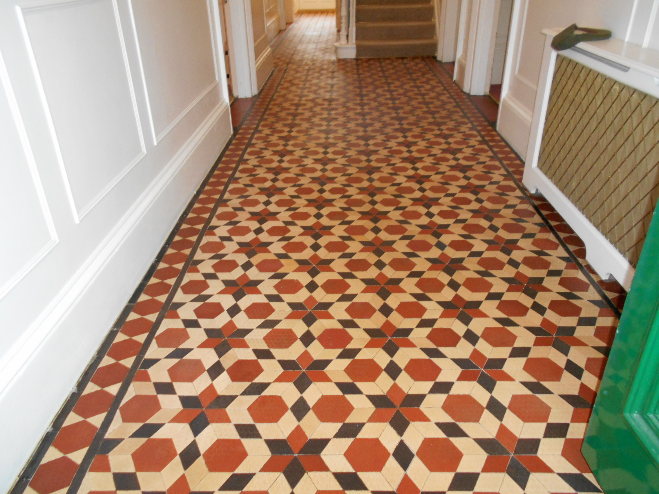 Unusual Victorian Hallway tiles with diamond shape tiles. Cleaned and restored in Hertfordshire